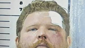 Police officer frees skunk with container stuck