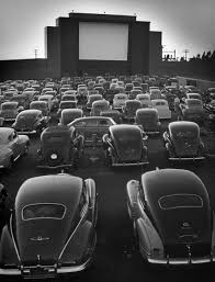 A white car was parked in 2 : Vintage Pictures Of Drive In Movie Theaters