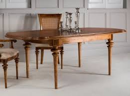 Set up a teak table with enough room for family and friends during alfresco meals. Frank Hudson Spire Oval Extending Dining Table Walnut Cfs Furniture Uk