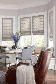 (i think they're called bow or compass windows and i think that part of our house is called a two story, half turret). The Ultimate Guide To Blinds For Bay Windows Blinds Com Window Treatments Living Room Living Room Blinds Bay Window Living Room