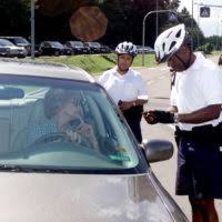US Air Force SENIOR AIRMAN Terry Birnell, a volunteer crossing guard,  provides a friendly face