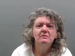 Woman arrested behind North Vernon business