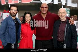 Chris Evans, Lucy Liu, Dwayne Johnson, Kiernan Shipka, JK Simmons and  Bonnie Hunt at the Photocall for Red One, Potters Field, London Stock Photo 