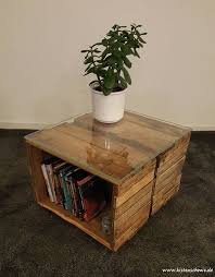 We found the perfect baskets to fit inside the crates at target for about $13 a piece. Mini Chilli Milli Table Made Of Old Wine Crates With Glass Plate Due To The Different Colours Of The Individual Wine Crat Crate Coffee Table Crate Table Crates