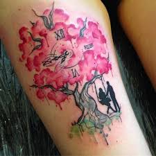 This cherry blossom with asian lettering tattoo includes an abstract like black and pinked inked cherry blossom tree, and near the tree is a japanese letter inked in black. 125 Cherry Blossom Tattoo Ideas You Never Knew Existed Wild Tattoo Art