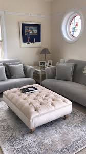 They both can offer storage, function as tables, and serve as a central focal point and spot for decor. Chesterfield Style Footstool Coffee Table Large Deep Buttoned Footstool Ottoman Bespo Tufted Ottoman Coffee Table Footstool Coffee Table Ottoman In Living Room
