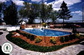 Here Is An Onground Pool With A Cedar Deck And Cedar Skirt Around It This Pool And Deck Are At The Pool Shop In Pool Images Above Ground Pool Landscaping Pool