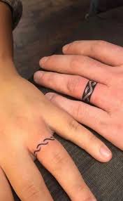 Rings are the best jewels you can get for your partner, especially if you're getting married! 100 Unique Wedding Ring Tattoos You Ll Need To See Tattoo Me Now