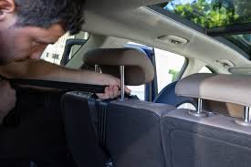 In the second row, the two outer seats are within plastic guides and the central one is at the bottom of the seat back, not in a plastic guide. Baby Car Seat Installation How To Install A Car Seat Correctly Carsguide