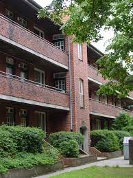 Kock siedlung nms wohnungen.im mittelpunkt unseres täglichen handelns steht die sichere und sozial verantwortbare versorgung unserer mitglieder mit wohnungen. Datei Neumunster Kocksiedlung 50er Jahre Laubengang Jpg Wikipedia