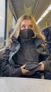 Flashing her tits on the train - ThisVid.com