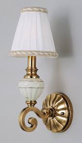 Item is pre owned and in good condition (the finial has been repaired see image) Quoizel Undefined Burnished Brass Up Lighting Wall Sconce From The Lenox Collection Lightingdirect Com