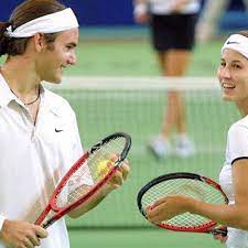 Roger federer of switzerland and his wife mirka federer celebrate with the norman brookes challenge cup after federer won the 2018 australian open. Tennis Roger Federer Snubs Wife Mirka In Twitter Comeback Roast