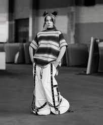 'british vogue' has revealed its june 2021 cover featuring stunning photos of billie eilish wearing lingerie and showing off a new tattoo. Billie Eilish S Vogue Cover How The Singer Is Reinventing Pop Stardom Vogue