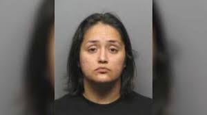 Police seek mom accused of crashing car into son's barber