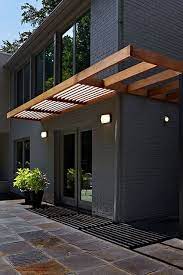 Lausell S Aluminum Fixed Louvers Can Make This Clean Modern Statement On Your Home Maintenance Free And Allowin Exterior Brick Modern Exterior House Exterior