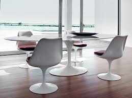 Forged by the mid century modern era gods of furniture design, these chairs were the epitome of innovation when they were tulip chair usage: The Sculptured Simplicity Of Tulip Chairs Tables Are The Epitome Of Modern Design Find Tulip Ta Saarinen Dining Table Dining Table Marble Tulip Dining Table
