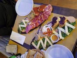 Brie cheese, gruyere, fig jam (or figs), sliced apples or pears, chorizo, serrano ham, rosemary crackers, almonds. The Best Antipasto Platter Of Our Trip To Rome Picture Of La Salumeria Rome Tripadvisor