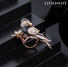 Blue Bird With White Ring Around Neck Uncage Your Deepest Fantasy Beautiful Bird Ring Adorned With Tsavorite On The Head A Blue Sapphire Neck With Wings Of 18k Ro Gold Set Bird Rings Accessories