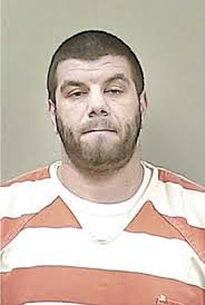 Suspect in Iron Mountain robbery back in court