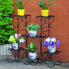 Check out our plant stand with pot selection for the very best in unique or custom, handmade pieces from our planters & pots shops. China High Quality 4 Tiers European Retro Style Indoor Outdoor Wrought Iron Plants Stand Flower Pots Holder Display Shelf 3 Colors Available China Metal Iron Flower Pot Rack And Land Plant Stands Price