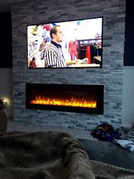 Save on electric fireplaces at jcpenney®. Electric Fireplace And Tv Built In Stone Wall Stone Walls Interior Fireplace Tv Wall Fireplace Wall