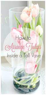 You can use it as a modern table centerpiece that is accentuated. Modern Tulip Arrangement Ideas For Spring Tulips Arrangement Flower Arrangements Simple Spring Flower Arrangements