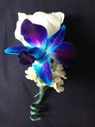 Boutonniere Of White Lisianthus And Blue Dendrobium Orchid Wedding Party Flowers Wedding Reception Flowers Prom Flowers