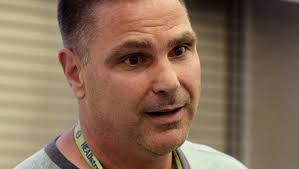 Brick board trims school budget after aid cut