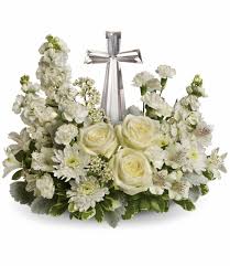 Sympathy flower arrangement honor a loved one's life with sympathy flowers that match their personality best. Crystal Cross Flower Arrangement Funeral Flowers