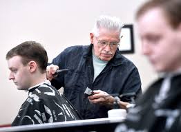 Ready Teddy: Barber, 85, and sidekick Slick Willie, 22, barber on