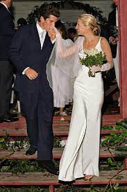 Meghan Markle S Second Wedding Dress Was Definitely Inspired By Carolyn Bessette Kennedy Celebrity Wedding Gowns Celebrity Bride Celebrity Wedding Photos