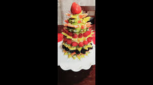 Stand the pineapple upright on a plate and attach several toothpicks to its top. How To Make Amazing Christmas Fruit Tree Youtube