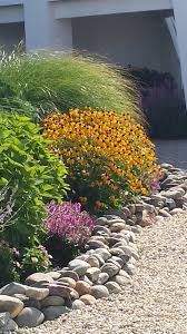 Beautiful Late Summer Color With Black Eyed Susan And Maiden Grass Backyard Landscaping Landscape Edging Front Yard Landscaping