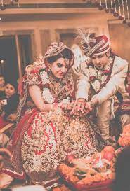 Rituals Performed By Bride And Groom Indian Wedding Bride Indian Wedding Photography Wedding Couple Poses Photography