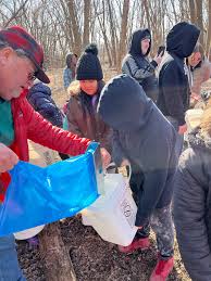 Third graders from W-K Elementary and students from the Winona Area  Learning Center had an unforgettable hands-on learning experience at  Prairie Island Campground last week. They explored the sap collecting  process, learned