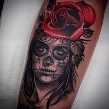 Rose tattoos, however, come in a wide variety of patterns, colors, and combinations, and the meaning behind each different type of tattoo might vary with its design. Man With Gorgeous Red Rose And Day Of The Dead Woman Tattoo On Forearm Tattoos For Guys Tattoos Rose Tattoo Dropkick Murphys