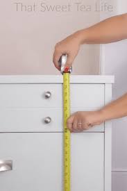 A single large drawer emerges from the lower, movable bed frame, while intricate shelving is built into the sides and center. The Diy Storage Bed Hack You Won T Believe That Sweet Tea Life