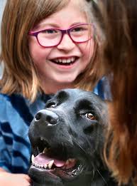 Sisters Jeana, left, and Lea Costello before Sherando High School's  graduation Thursday evening in Arrowhead Stadium. Scott Mason/For The  Winchester Star