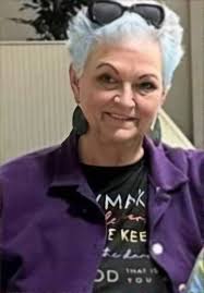 What are some ideas for a new hairstyle, should I get a pixie cut or let my  hair grow out?