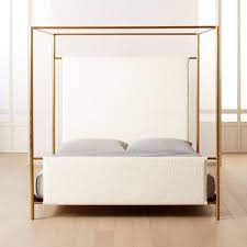 Edged with iron corners finished in glam plated brass, dark design rises 80 high from the ground. Shop Odessa Shearling Canopy Bed King Brass Plated Iron Rod Frames This Modern Canopy Be Bed Frame And Headboard Modern Canopy Bed Modern Beds And Headboards