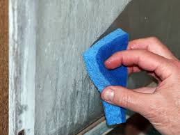 Applying one of several mild, cleaning solutions a handy abrasive sponge or scrubbing pad How To Remove Soap Scum