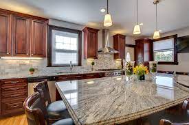 These colors greatly complement the dark cherry shade because it gives a wonderful contrast to the dark tones of the cabinets. Viscont White Granite Countertops With Cherry Cabinets Contemporary Kitchen Boston By Stone Projects Houzz