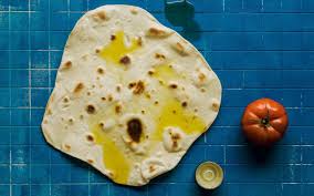 2 tablespoons finely chopped herbs, such as mint, dill or cilantro, plus herb sprigs, for serving Easy Flatbread Recipes From India Italy And The Middle East