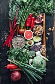 Food Collection Of Raw Food Fruits And Vegetables On A Tablet By Ina Peters For Stocksy United Raw Food Recipes Green Grapes Nutrition Nutrition