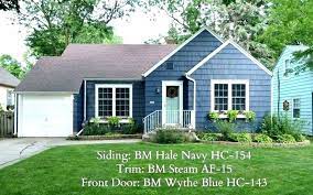 Bold and electrically blue for your cape cod, colonial, or other classic homes. Blue House Exterior Colour Schemes Best Colour Combination For House Exterior Navy Blue House Wi House Paint Exterior Ranch House Exterior Exterior House Color