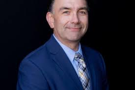 Assistant Dean for Development, Christian Gordon