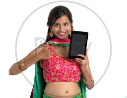 Image of Beautiful Traditional Indian Girl Showing Smart Phone Screen with  a Smile on Her Face-UO214322-Picxy