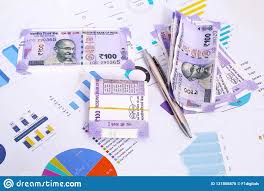 Picture Of New Indian Currency Rupees With Chart Paper And