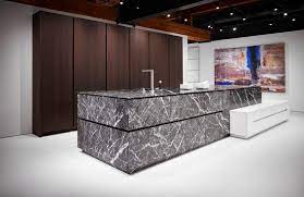 hideaway custom kitchen with island grigio carnico unique collection by eggersmann kuchen kitchen modular modern kitchen storage kitchen design